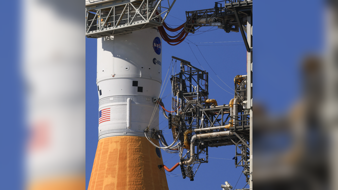 NASA's Artemis II SLS (Space Launch System) rocket and Orion spacecraft back at the VAB for repairs following a helium flow leak. 