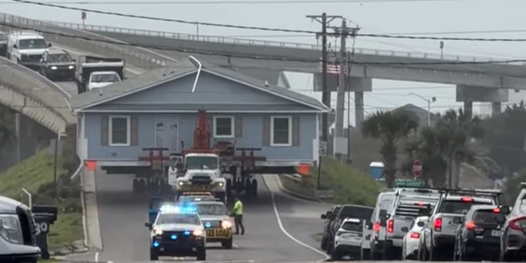 See it: Entire house on small North Carolina highway creates unusual traffic jam