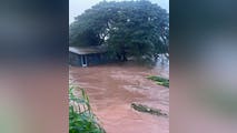 U.S. Coast Guard rescues 7 people and a dog after the worst flooding in 20 years hits Hawaii