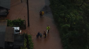 Torrential rain triggers dangerous flash flooding in Hawaii, forcing thousands of evacuations