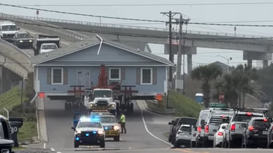 See it: Entire house on small North Carolina highway creates unusual traffic jam