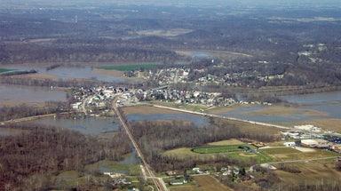 Two people found dead after multiple cars swept off flooded road in Indiana