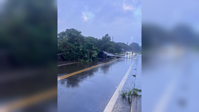 A collapsed structure on a road on O'ahu in Honolulu County on Friday, March 20, 2026.