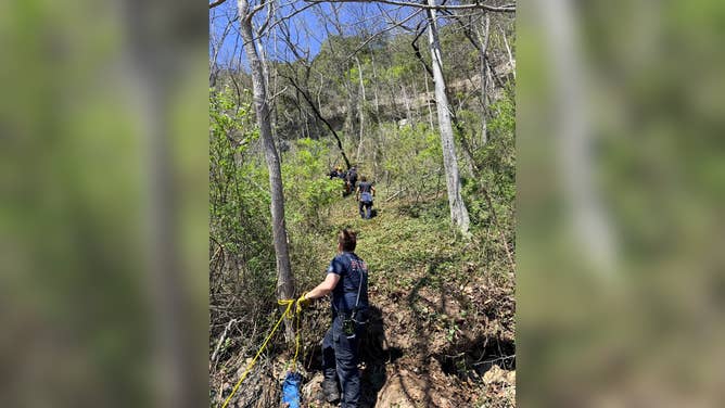 Members of the Branson Fire Department rescue an injured hiker in Missouri.