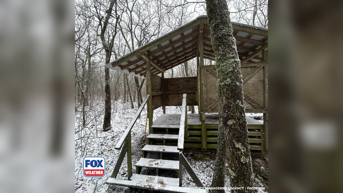 Location where injured hiker took refuge under shelter.