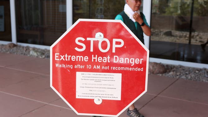 A heat advisory sign is shown at Furnace Creek Visitor Center during a heat wave in Death Valley National Park in Death Valley, California, on July 16, 2023.