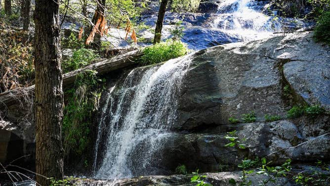 The walk to Crystal Cave in Sequoia National Park requires a half-mile hike but the views are quite pleasant and include sites of waterfalls along the way.