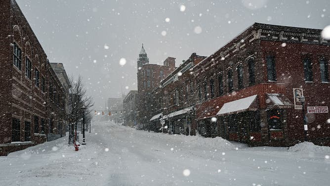 In Marquette, Michigan, on February 18, 2026, as a winter storm warning is announced, heavy snow continues to fall with this winter storm bringing snow, ice, and hazardous conditions across Michigan, where up to 15 inches of snow are expected.