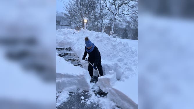 Residents shovel snow after a record-breaking blizzard in Rhode Island in February.