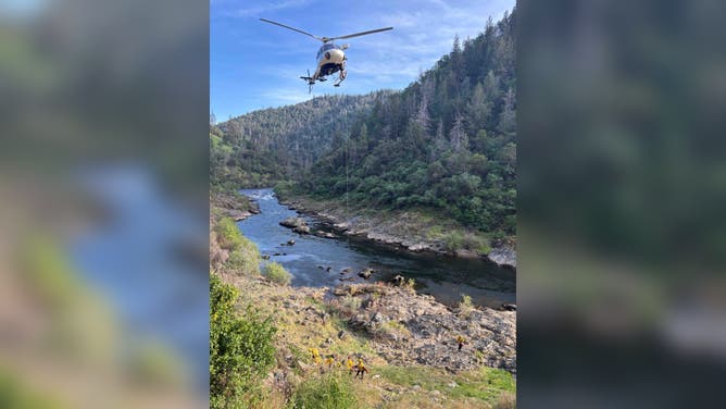A helicopter arrives to help rescue an injured hiker in California.