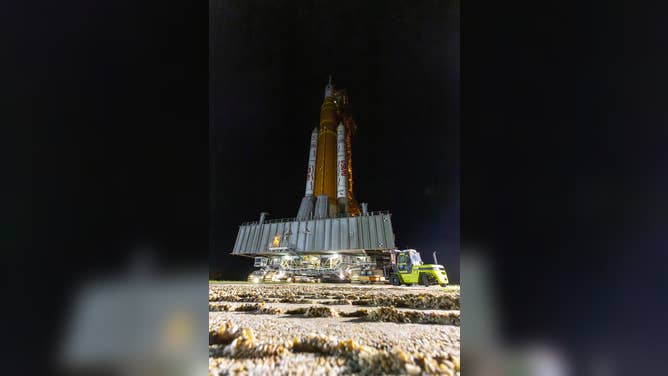 NASA’s Artemis II SLS (Space Launch System) rocket and Orion spacecraft, secured to the mobile launcher, is seen inside the Vehicle Assembly building as preparations continue for roll out to Launch Pad 39B, Thursday, March 19, 2026, at NASA’s Kennedy Space Center in Florida.