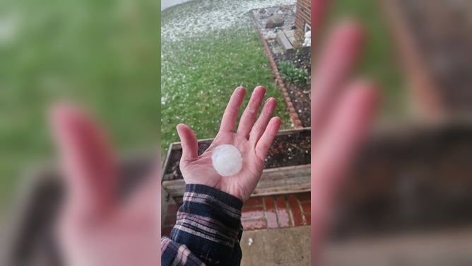 Severe storms blast Bryan, Ohio with large hail Thursday.