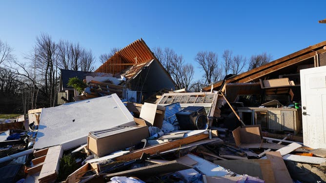 Photos from the ground in Aroma Park, Illinois, on March 12 capture the devastating destruction in Kankakee County after a tornado ripped through March 10