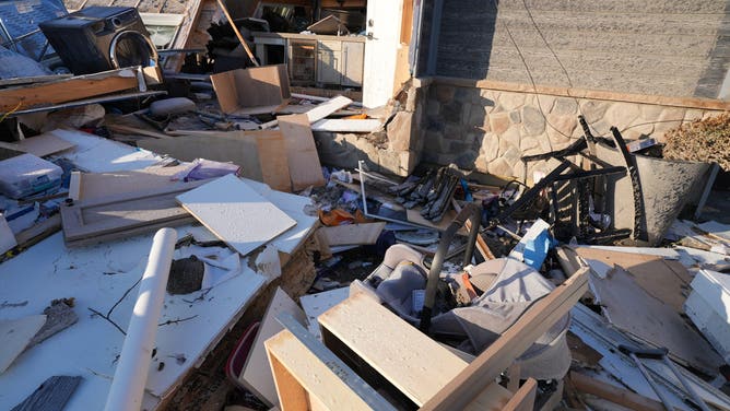 Photos from the ground in Aroma Park, Illinois, on March 12 capture the devastating destruction in Kankakee County after a tornado ripped through March 10