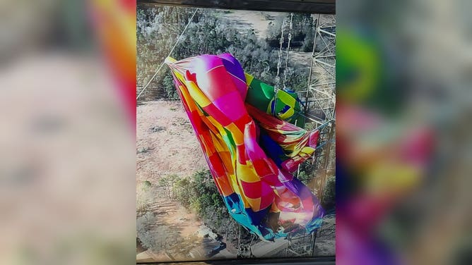 A hot air balloon carrying two passengers struck an approximate 925-foot cell tower in Longview, Texas, on Feb. 28.