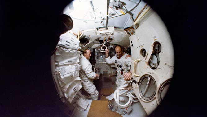 (22 Oct. 1969) --- A fish-eye lens view of astronauts Charles Conrad Jr. (on left), Apollo 12 commander, and Alan L. Bean, lunar module pilot, inside the Apollo Lunar Module Mission Simulator during simulator training at the Kennedy Space Center (KSC).