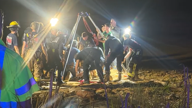 First responders free a man stuck in quicksand after hours of rescue efforts in Florida.