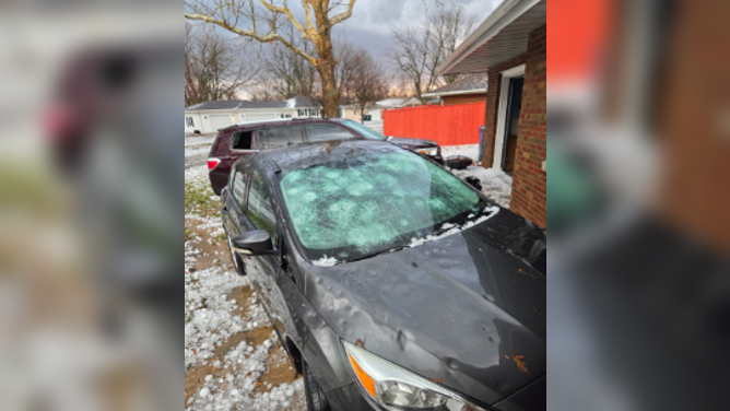Large hail damages car Bradley, IL, March 10.