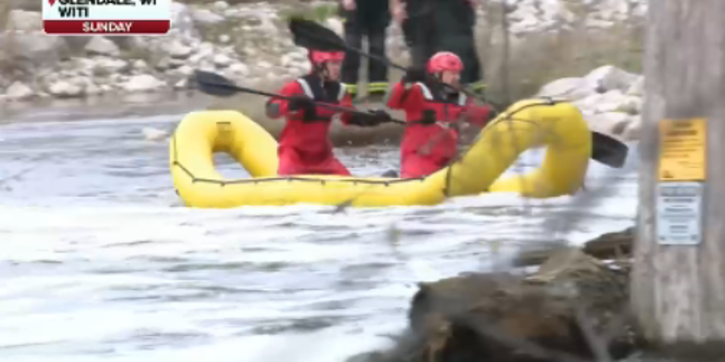 Video: Father and son rescued after capsizing in rough waters while kayaking in Milwaukee River