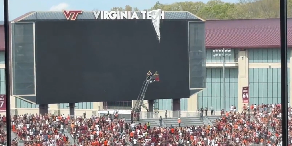 Watch: Parachuter crashes into scoreboard before Virginia Tech spring football game