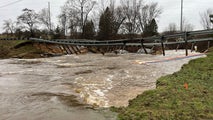 Popular Michigan bridge destroyed as river hits historic flood level