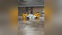 Firefighters rush to rescue 3 from Wisconsin home amid rising floodwaters