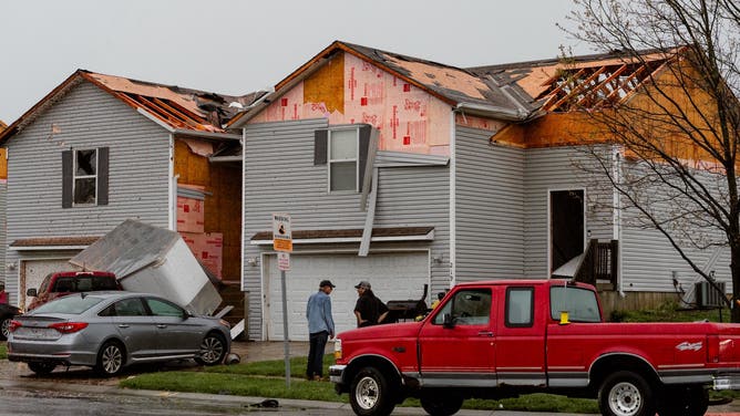Homes damaged in Belton, Missouri, after severe weather on Friday.
