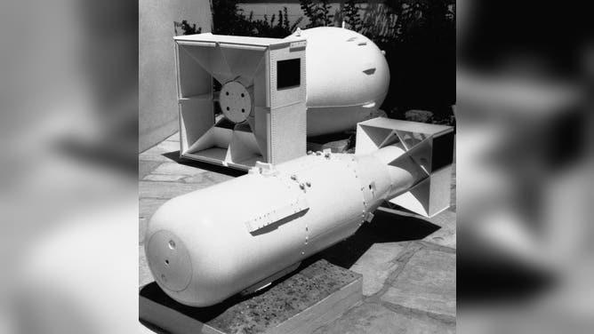 Replicas of two atomic bombs, "Little Boy" and "Fat Man," on display at the Scientific Hall and Museum in Los Alamos, New Mexico. The original bombs were dropped on Hiroshima and Nagasaki, Japan, August 1945. Ca. 1947-1972.
