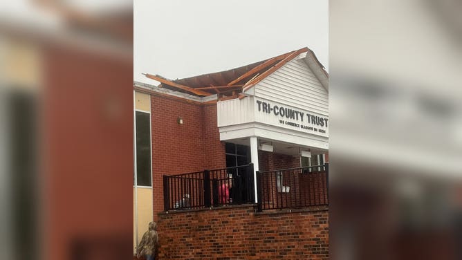 Severe weather damages homes and municipal buildings in Glasgow, Missouri.