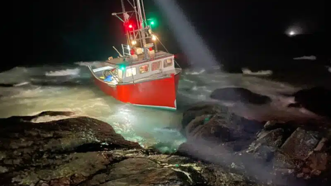 Multiagency rescue effort after fishing boat runs aground in Gloucester, Massachusetts Saturday.