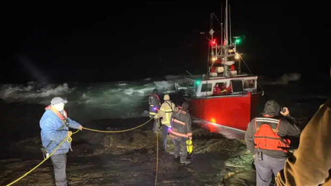 Multiagency rescue effort after fishing boat runs aground in Gloucester, Massachusetts Saturday.