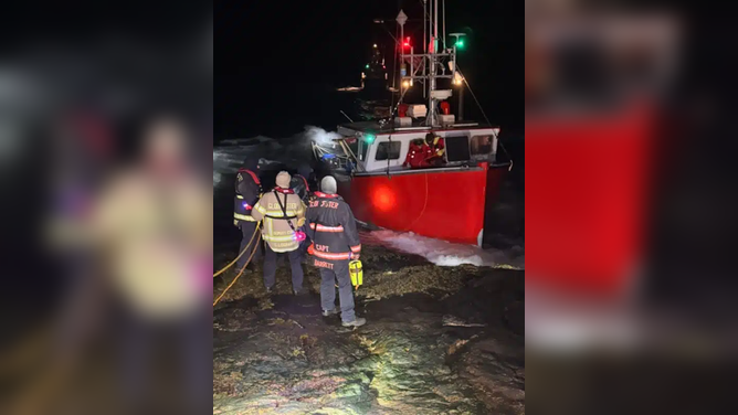 Multiagency rescue effort after fishing boat runs aground in Gloucester, Massachusetts Saturday.