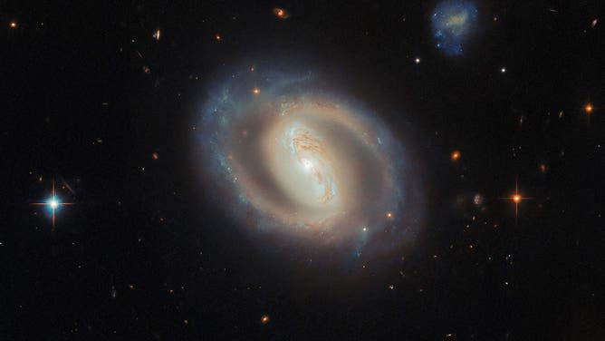 View of the galaxy IC 486 from the Hubble Telescope.