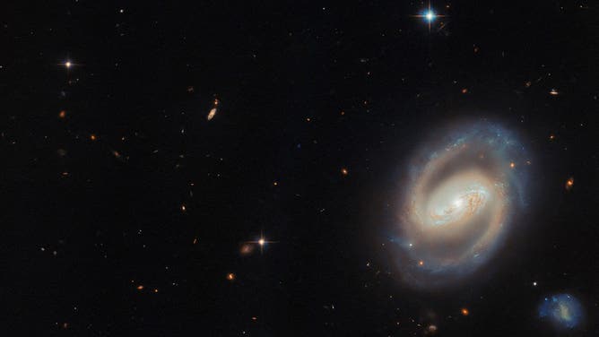 A wide-field view of the spiral galaxy IC 486 from the Hubble Telescope.