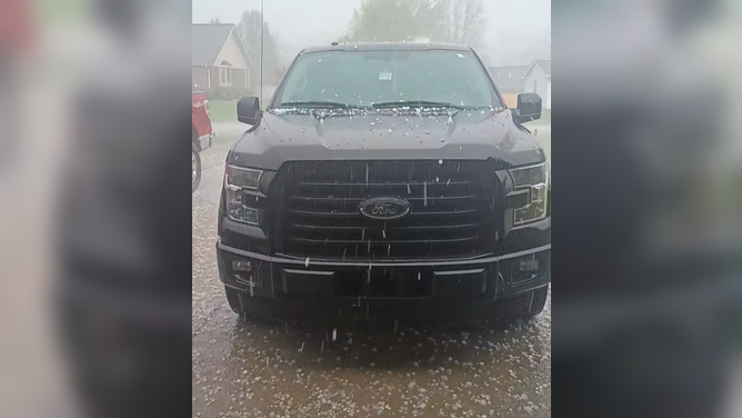 Hail pelts cars successful  Marion, Indiana.