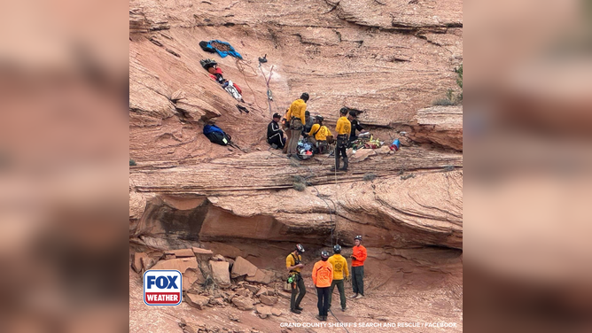 Members of the Grand County Sheriff’s Search and Rescue team complete a technical rope rescue for an injured hiker after falling 80 feet in a Utah canyon.