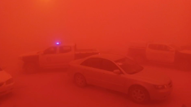 Dust storm turns skies bright red/orange in Libya, prompting state of emergency.