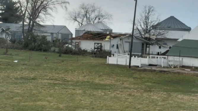 Wind gusts damage farm in West Branch, Iowa on Thursday.
