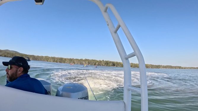They used boats to pull the whale off the sandbar.