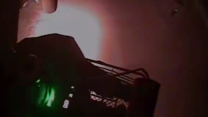 The person is escorted into the helicopter.