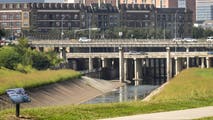 Search for woman swept away by waters in Houston suspended after no luck, officials say