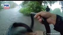 Watch: First responders rescue infant after car is trapped in rushing Texas floodwater
