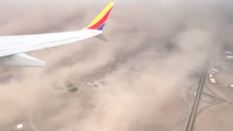 Watch: Airline passenger captures massive dust storm sweeping through New Mexico city