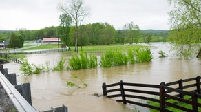 Woman dead after being swept away by swift water during flash flooding in Tennessee