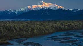 Alaskan town sees its last sunset for 84 days as the 'midnight sun' phenomenon of non-stop daylight begins