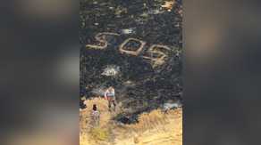 Sailor rescued in the knick of time as massive, record-breaking wildfire engulfs California island