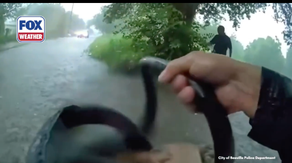 Watch: First responders rescue infant after car is trapped in rushing Texas floodwater