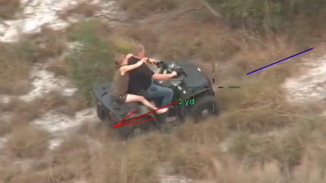 Pregnant women suffering from heat exhaustion is extracted from a Florida trail.