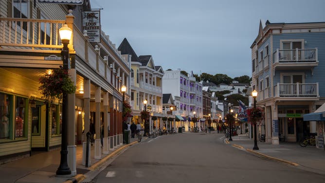 Mackinac Island, Michigan, Only horses and bicycles allowed on the island. Street scene of main street in downtown at night.