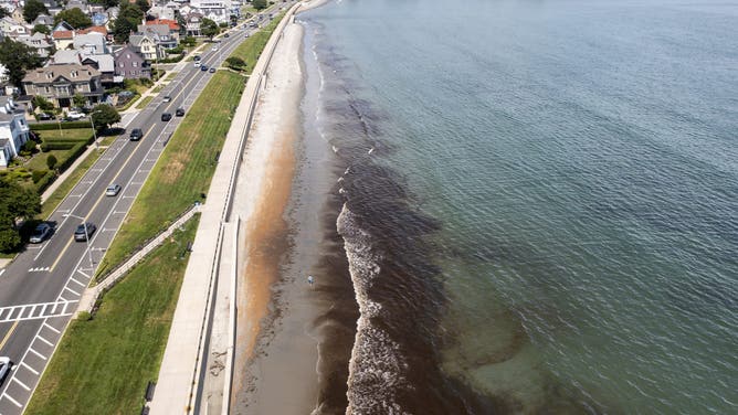 Lynn, MA - July 8: Aerial shot of the water and pollution at King's Beach. King's is one of the most polluted and frequently closed in the Boston area and is currently closed due to the high levels of bacteria.
